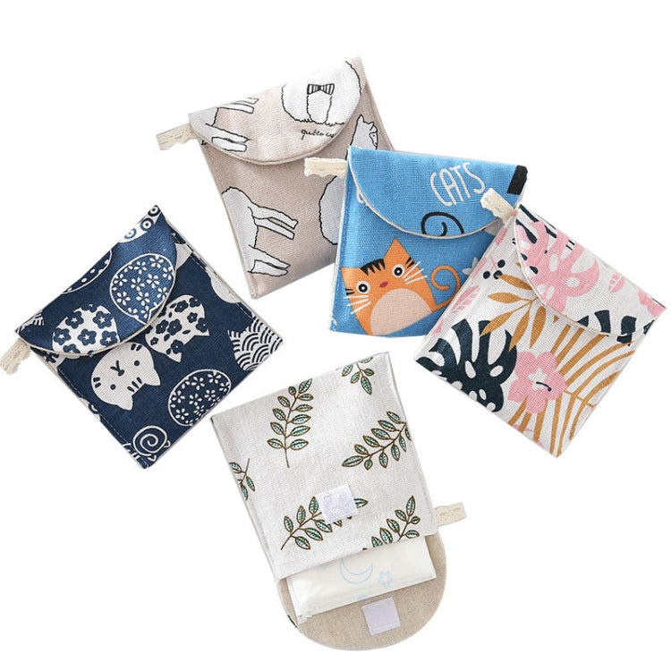 Eight animal-print cotton-linen storage pouches with snap front flaps