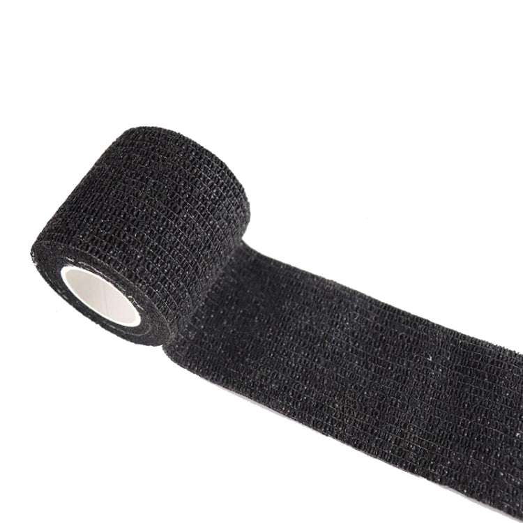 Black self-adhesive non-woven tape roll with textured camo fabric