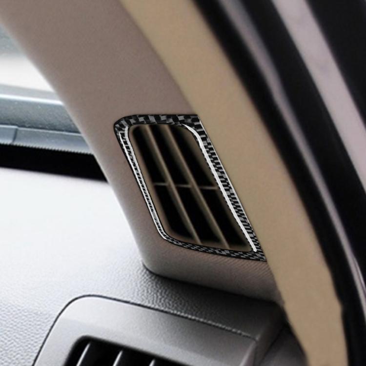 Close-up of carbon fiber-style vent outlet trim sticker on dashboard air vent
