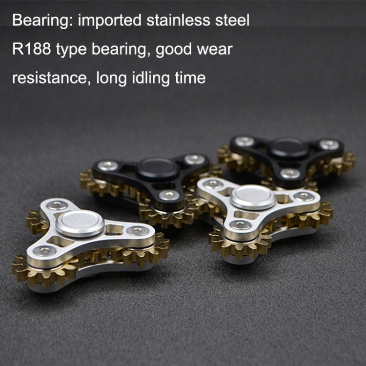 Four-gear fidget spinner product view: silver and black frames with gold-tone gears.