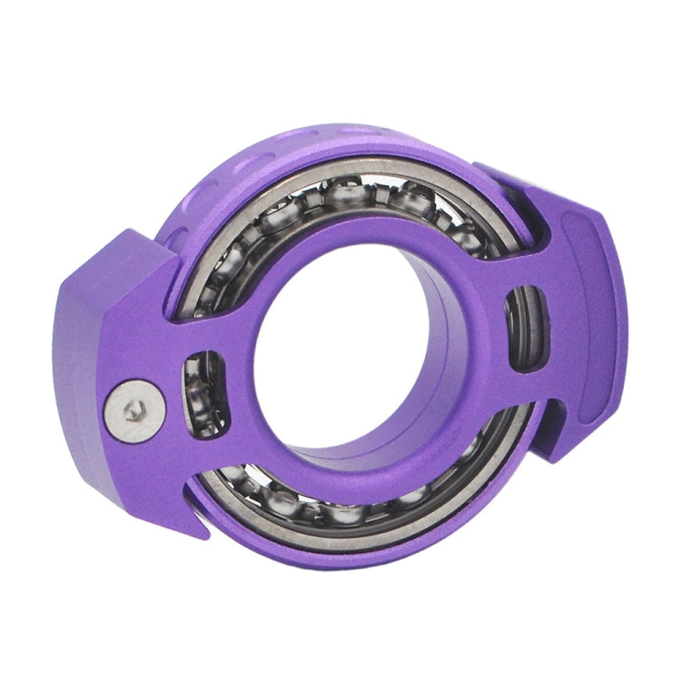 Purple nuclear-reactor fingertip gyroscope with visible ball bearings and side grips