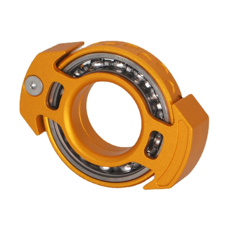 Orange nuclear-reactor fingertip gyroscope with chrome ball bearings and finger ring