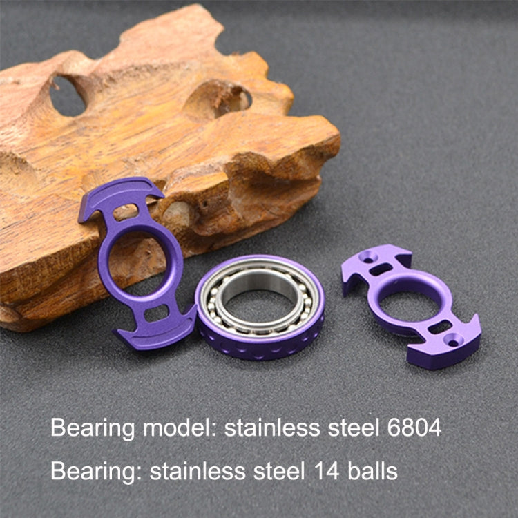 Purple nuclear-reactor fingertip gyroscope with exposed stainless-steel bearing