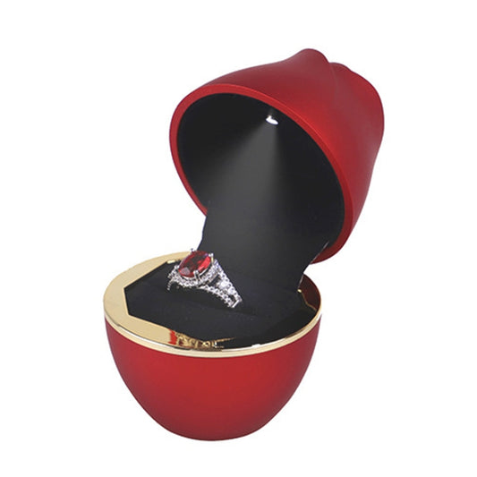 Red rose-shaped jewelry storage box with open ring holder and ring display