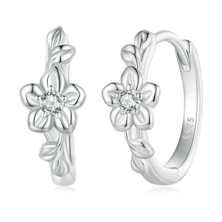 Sterling silver flower-vine hoop earrings with small round zircon center