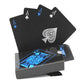 Playing cards with black faces and blue back design, shown in a boxed set