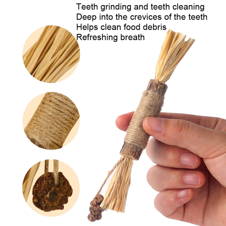 Jute-wrapped straw cat teething stick held in hand, detailed fiber tassels