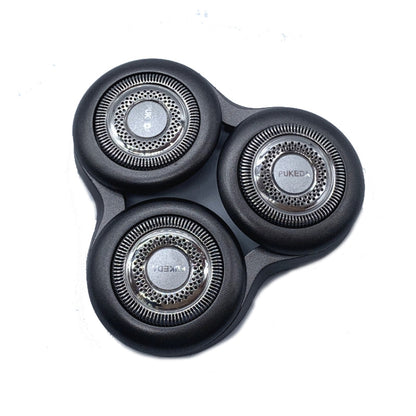 Three-round razor shaver blade head with metal foil discs on a black housing.