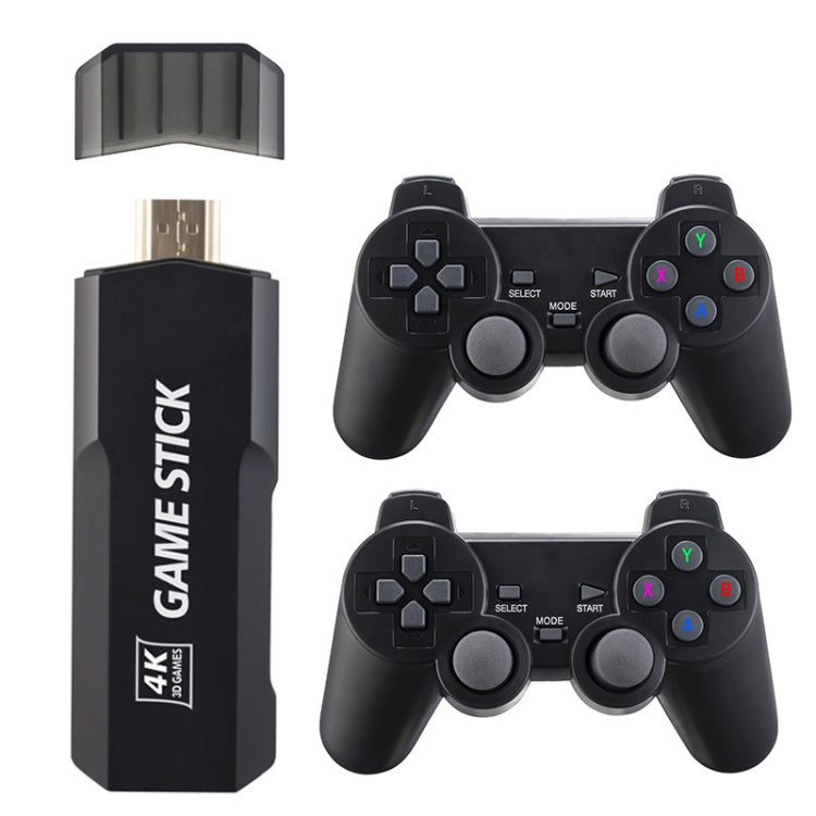 Black 4K Game Stick USB console with two wireless game controllers, ports visible