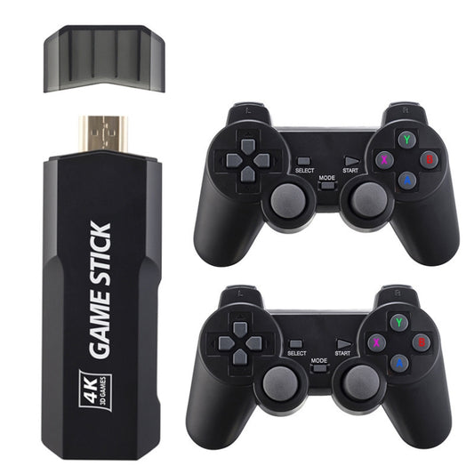 Black 4K Game Stick USB console with two wireless game controllers, ports visible