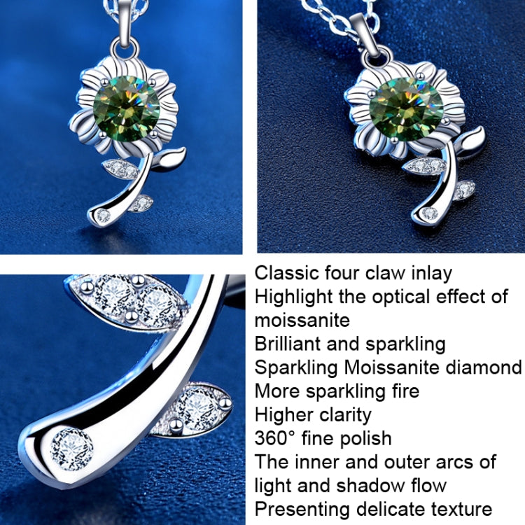 Silver sunflower pendant necklace close-up with green round gemstone and prong setting