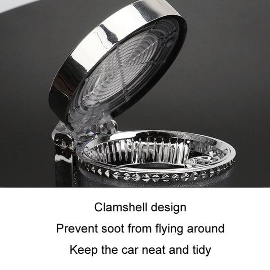 Chrome car ashtray with open clamshell lid and ridged inner tray