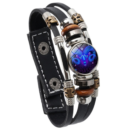 Black leather rope bracelet with silver beads and blue glowing zodiac emblem pendant