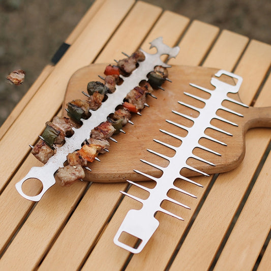 Fishbone barbecue skewer board with metal prongs holding assorted grilled meat