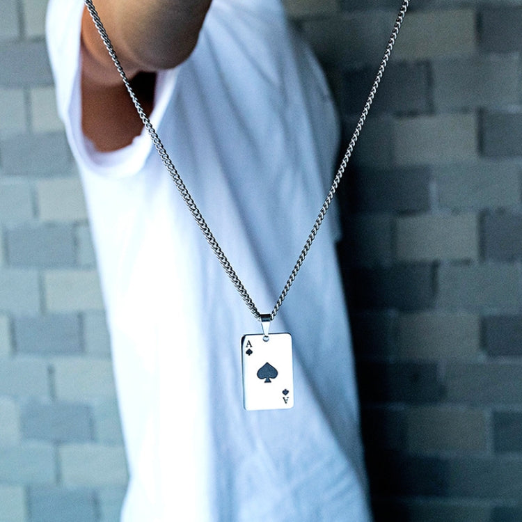 Poker card pendant necklace worn on chest with black A spade on silver tag and chain