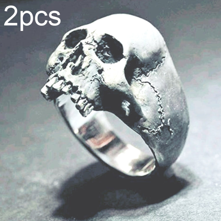 Silver-tone skull signet ring with detailed teeth and cracked skull texture
