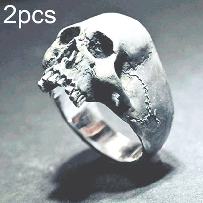 Silver-tone skull signet ring with detailed teeth and cracked skull texture