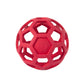 Red hollow rubber dog ball with geometric lattice cutouts for chewing and play