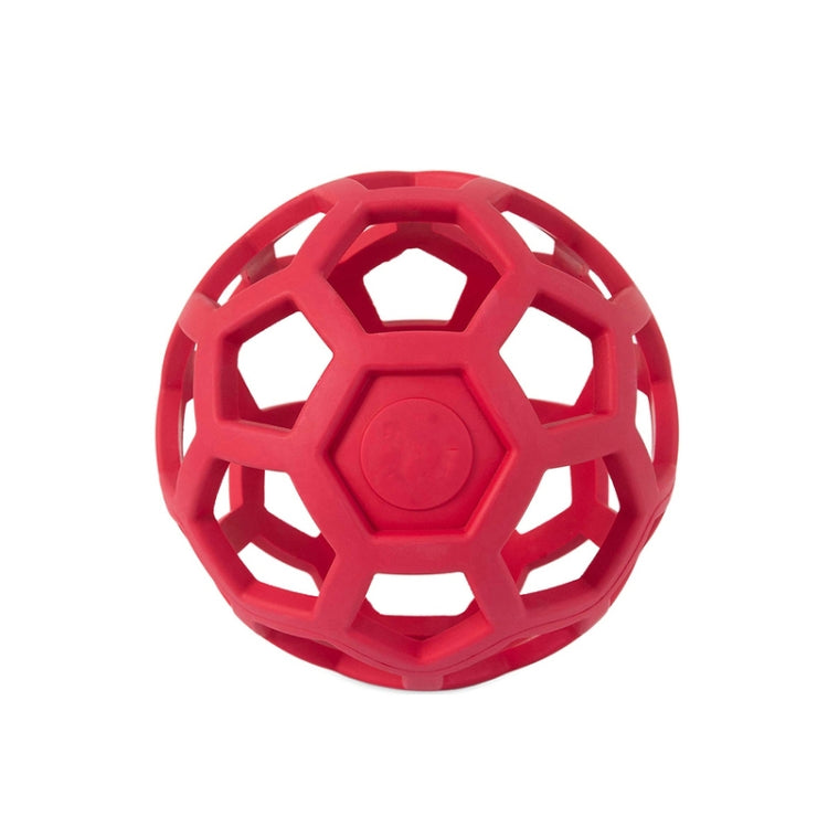 Red hollow rubber dog ball with geometric lattice cutouts for chewing and play