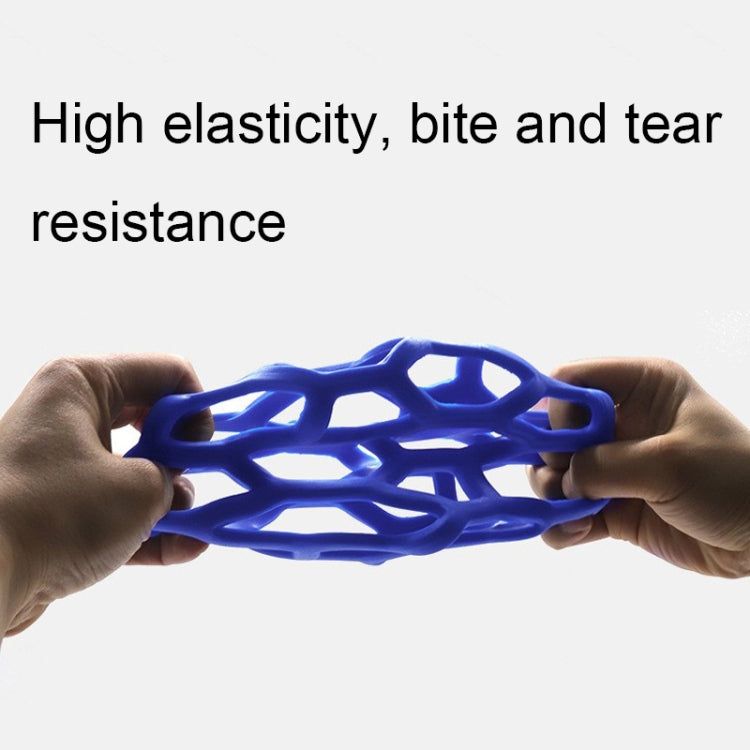 Blue hollow lattice rubber dog ball stretched between two hands
