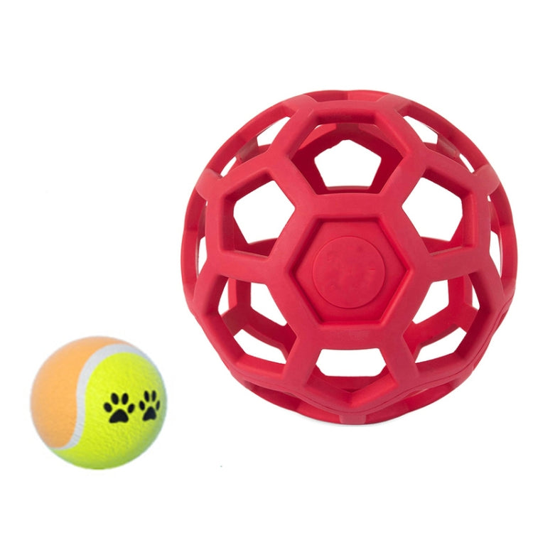 Red hollow rubber dog ball with geometric lattice cutouts and a yellow paw tennis ball