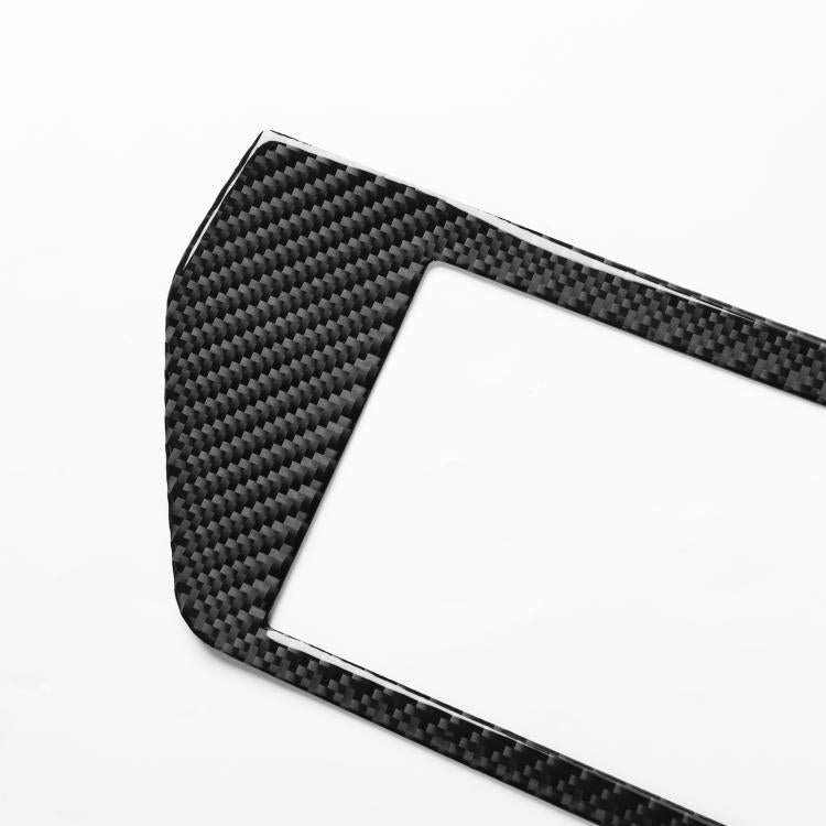 Black carbon-fiber style navigation screen frame sticker, angled close-up edge