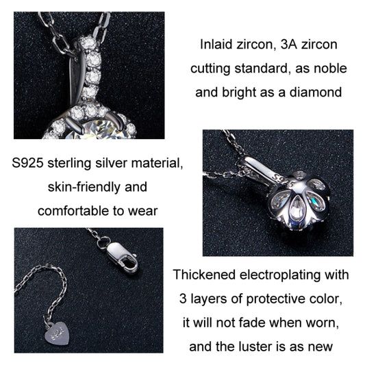 Sterling silver zircon pendant necklace close-up, prong-set round center with halo