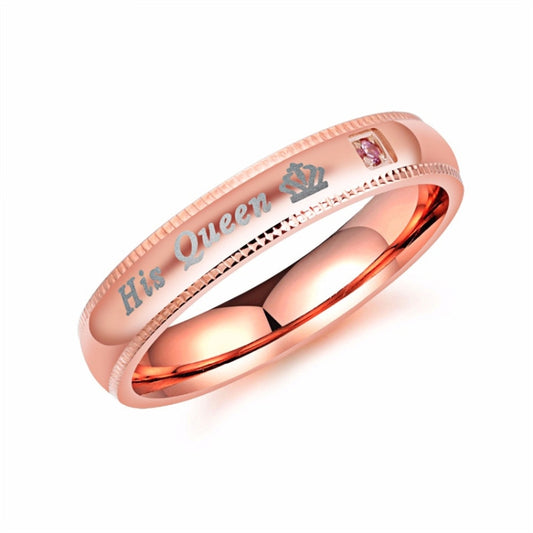 Couple ring set in rose-gold tone, engraved “His Queen” with small pink gemstone detail