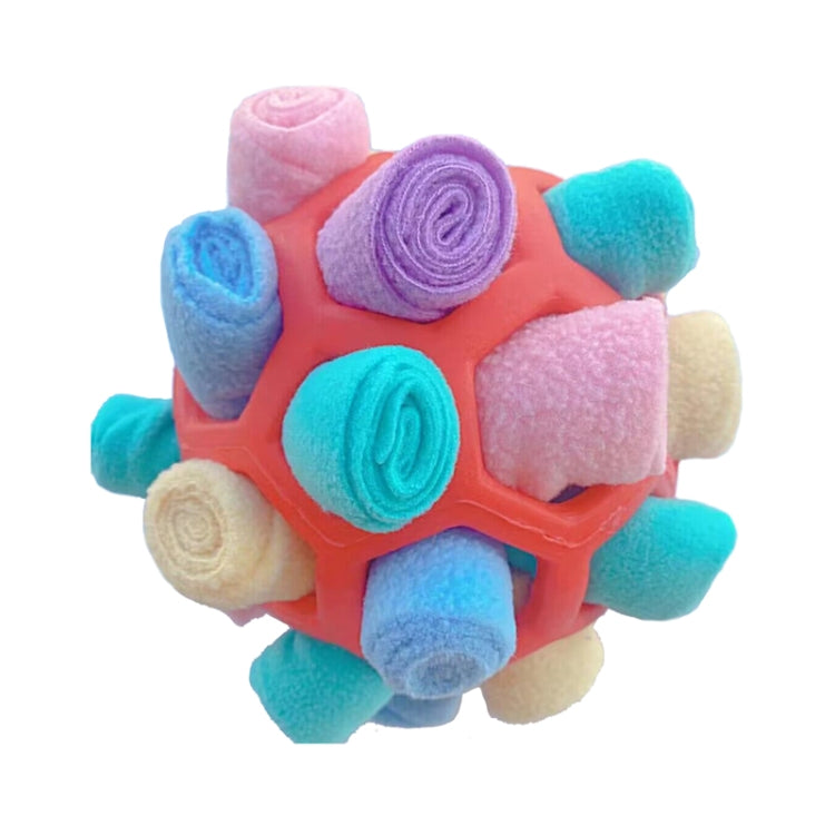 Orange and pastel plush dog sniffing ball with multicolor soft fabric spiral details