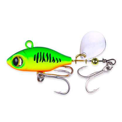 Sequin fishing lure with green/orange body, white spinner blade, twin treble hooks