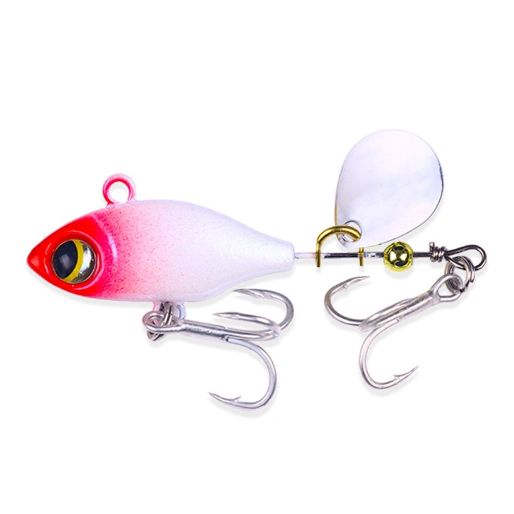 Sequin fishing lure with pink body, white spinner blade, twin treble hooks