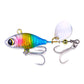 Sequin fishing lure with multicolor body, white spinner blade, twin treble hooks