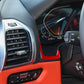 Installed black/red carbon-fiber dash trim stickers around instrument controls
