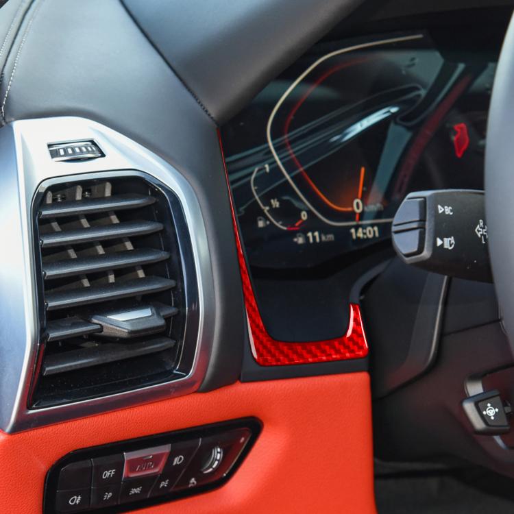 Installed black/red carbon-fiber dash trim stickers around instrument controls