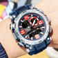 Men's sports watch on wrist, blue rubber strap and silver case with red-accent dial