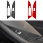 Carbon-fiber window switch trim stickers with cutouts, shown black and red