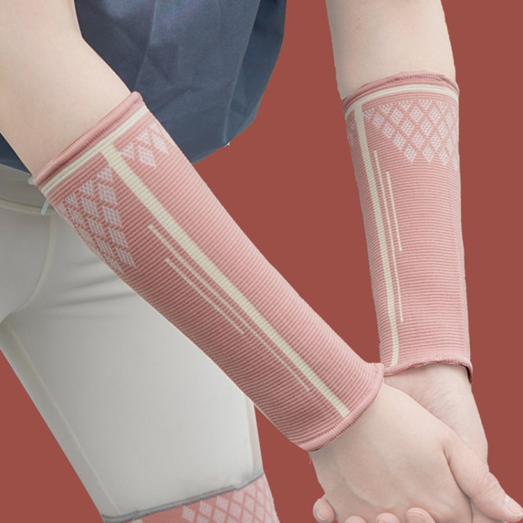 Pink striped extended volleyball wrist guards with padded compression sleeves