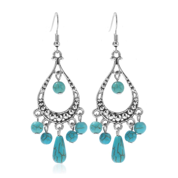 Turquoise drop chandelier earrings with teardrop fringe and silver-tone hooks