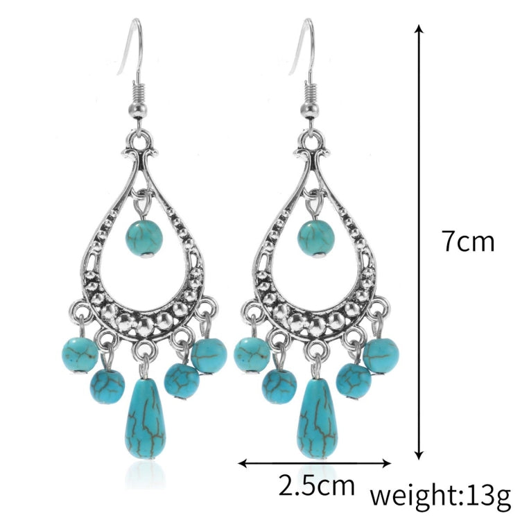 Turquoise teardrop chandelier earrings with bead fringe and silver-tone hooks