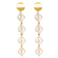 Gold top dangle earrings with three-tier white pearl drops