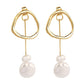 Gold-tone drop earrings with layered white pearls and curved hoop top
