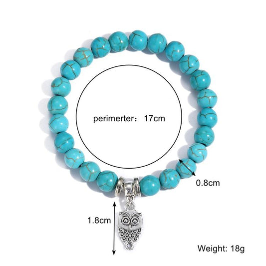 Turquoise beaded bracelet with silver owl charm and clasp, 17cm