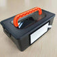 Water tank dust box with orange grip, dark gray housing and side filter panel