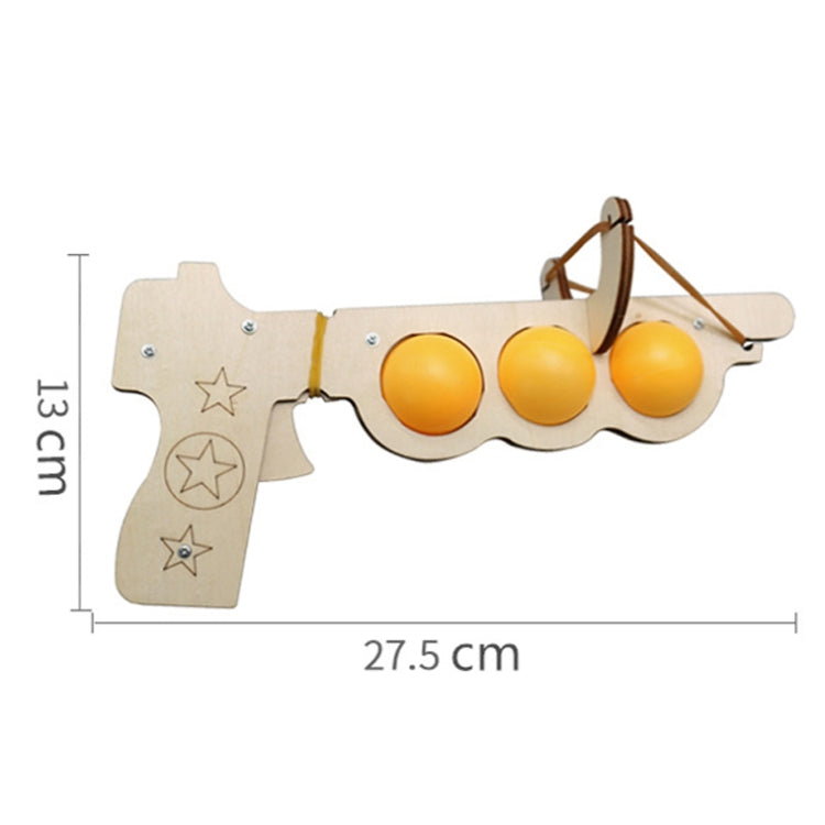 Wooden elastic table tennis launcher toy with three yellow balls and star cutout design