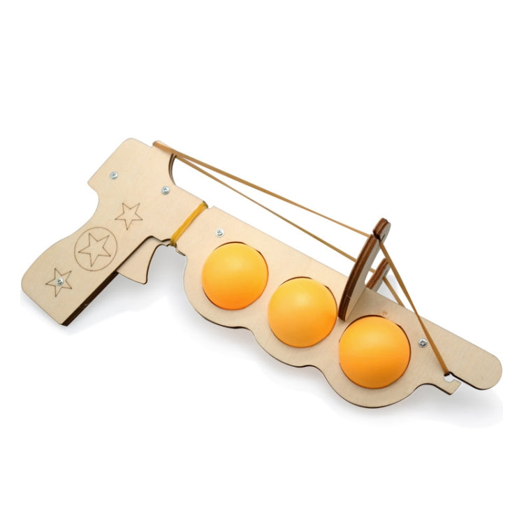 Wooden table tennis elastic launcher toy with three yellow balls and slingshot frame