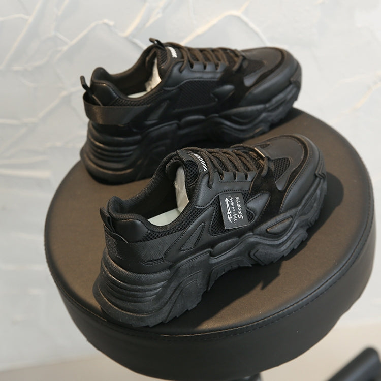 Black chunky lace-up sports shoes with padded collar and thick rubber sole
