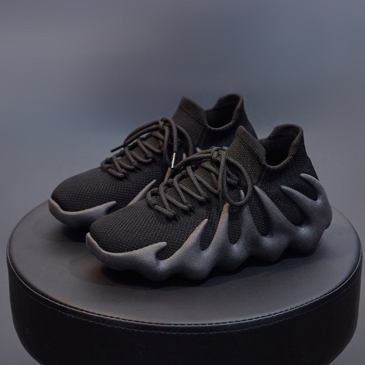 Black sock-style sneakers with lace-up top and molded rubber-look sole