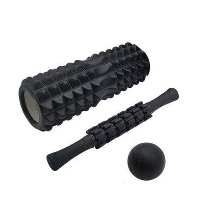 Black foam roller set with ridged roller, massage stick, and dark ball for muscle relief