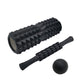 Black foam roller set with ridged roller, massage stick, and dark exercise ball