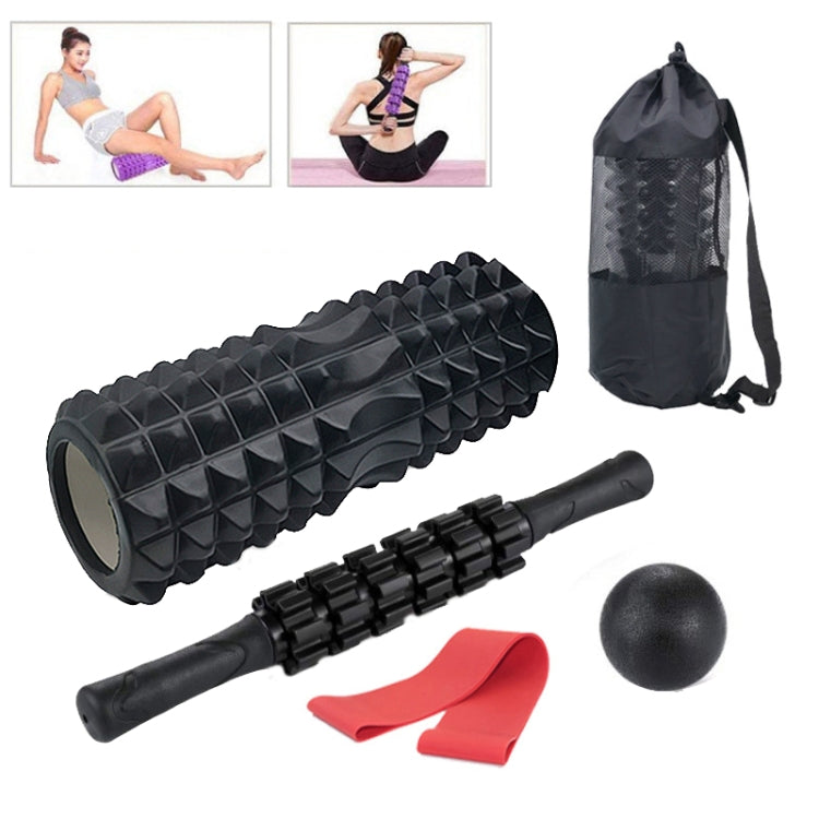 Black foam roller set with massage ball, foam stick, red drag band, storage bag